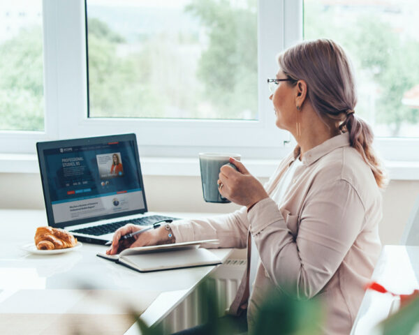 Female student with a laptop.